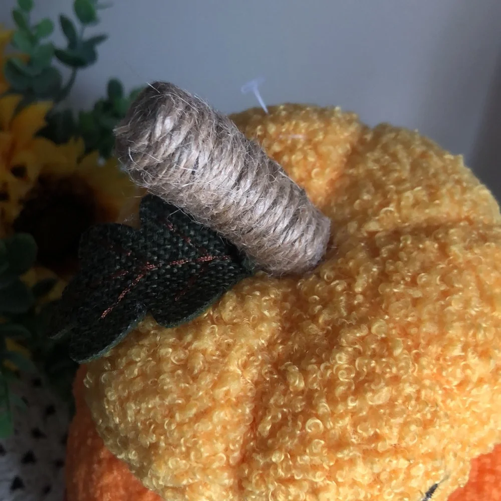 Stacked SHERPA Pumpkins with Smiley Faces